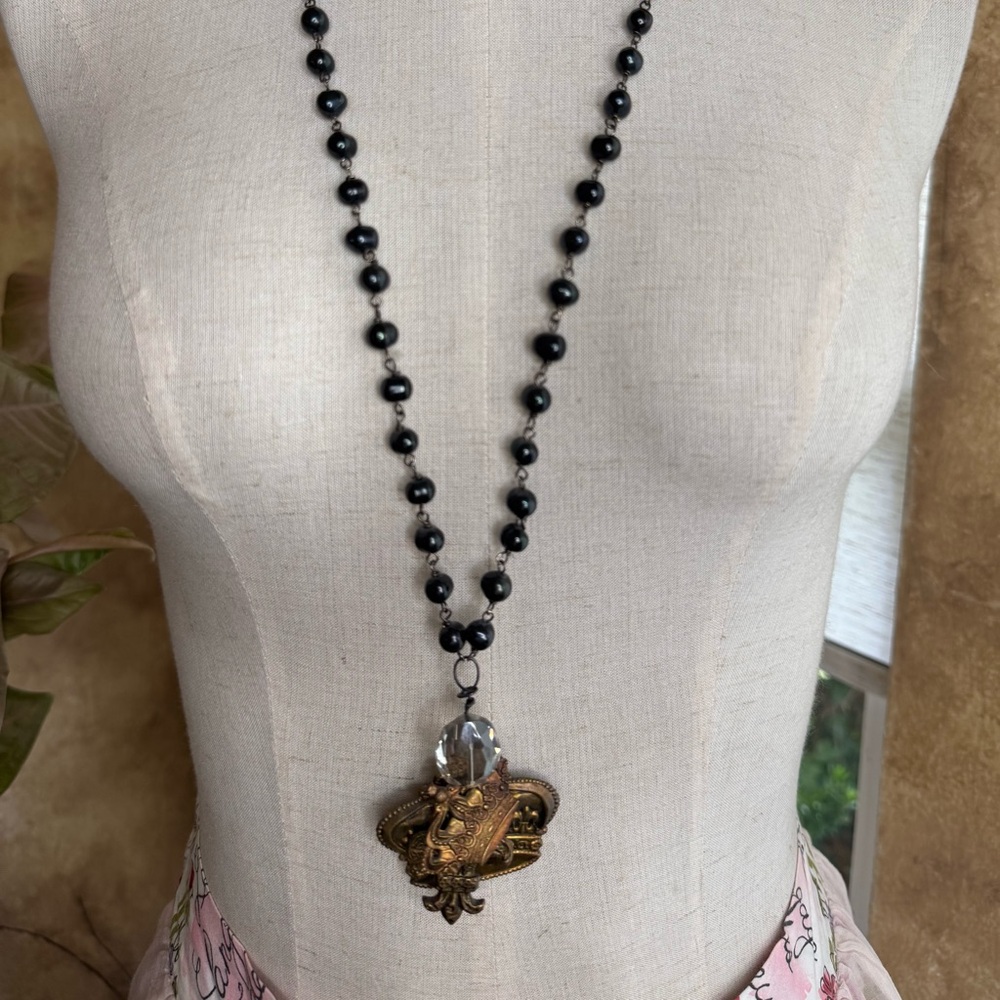 Glossy Black Beaded Necklace with Silver-Toned Accents